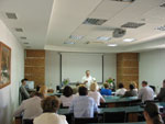 S.&nbsp;V.&nbsp;Aleshin speaking at the VI&nbsp;International Conference with his report on SCENAR-therapy